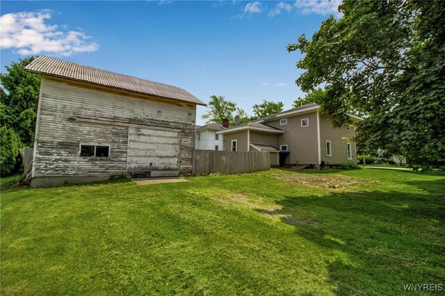 6305 E Main St, Byron, NY 14557 - rear view of house with an outbuilding