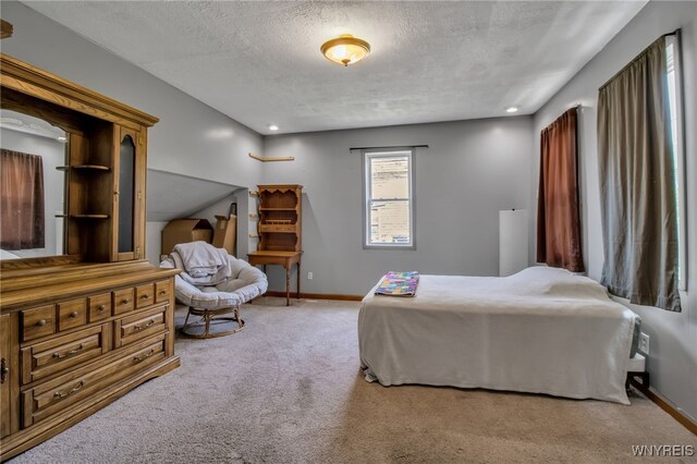 6305 E Main St, Byron, NY 14557 - carpeted bedroom featuring a textured ceiling, baseboards, and recessed lighting