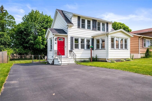 86 Leonard Rd, Greece, NY 14616 - view of front of home with entry steps and asphalt driveway