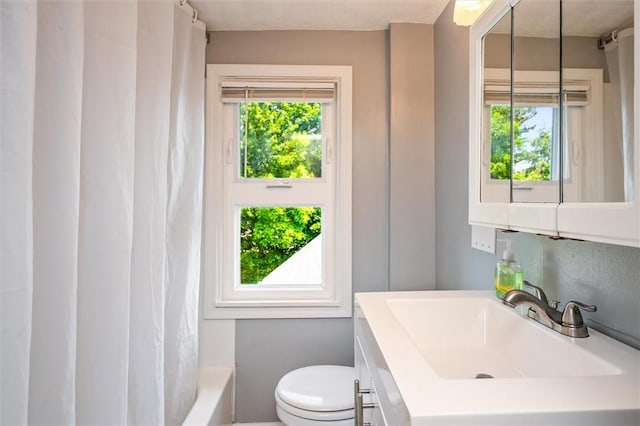 86 Leonard Rd, Greece, NY 14616 - bathroom with vanity, toilet, and shower / tub combo with curtain