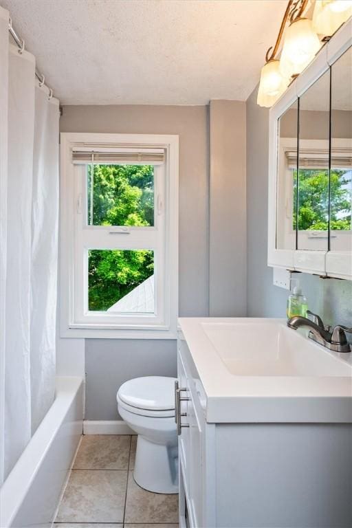 86 Leonard Rd, Greece, NY 14616 - bathroom with vanity, toilet, tile patterned floors, shower / tub combo with curtain, and baseboards