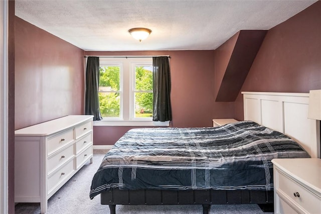 86 Leonard Rd, Greece, NY 14616 - bedroom with light carpet, a textured ceiling, and baseboards