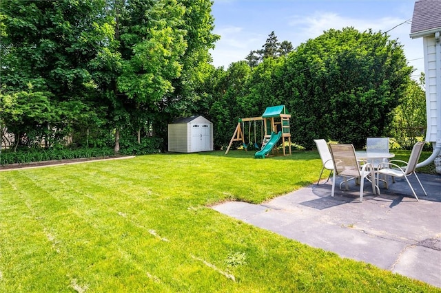 86 Leonard Rd, Greece, NY 14616 - view of green lawn featuring a patio and a playground