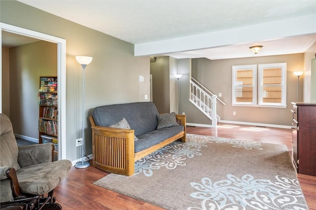 86 Leonard Rd, Greece, NY 14616 - living area featuring wood finished floors, stairs, and baseboards