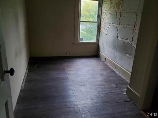 211 Vienna St, Arcadia, NY 14513 - empty room featuring dark wood-style floors