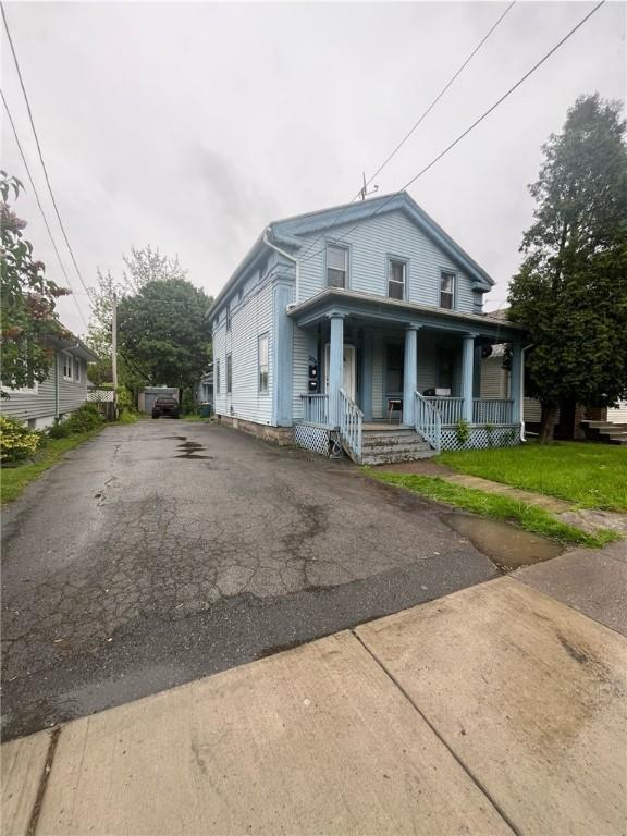 204 Fairgate St, Rochester, NY 14606 - view of front of home featuring covered porch and driveway