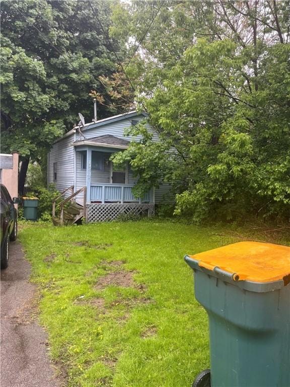 204 Fairgate St, Rochester, NY 14606 - view of grassy yard featuring covered porch