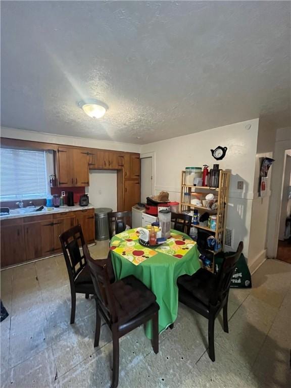 204 Fairgate St, Rochester, NY 14606 - dining space featuring a textured ceiling