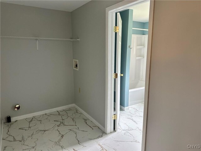 21 Church St, Fine, NY 13617 - washroom with light marble finish flooring, washer hookup, and baseboards