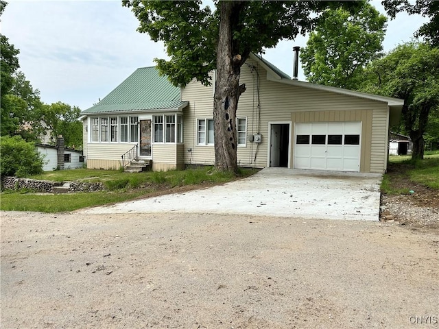 21 Church St, Fine, NY 13617 - traditional-style home with entry steps, driveway, and an attached garage
