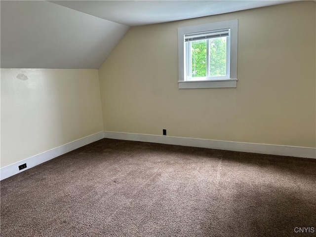 21 Church St, Fine, NY 13617 - additional living space with carpet, baseboards, and vaulted ceiling