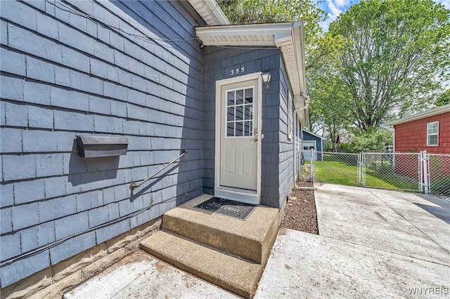 355 Bryant St, North Tonawanda, NY 14120 - view of exterior entry featuring a gate