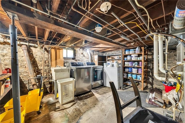 355 Bryant St, North Tonawanda, NY 14120 - basement featuring washing machine and clothes dryer