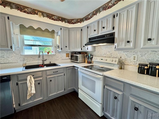 5812 S Street Rd, Fleming, NY 13021 - kitchen with stainless steel appliances, gray cabinets, under cabinet range hood, and a sink