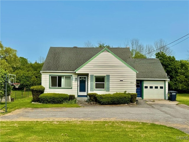 5812 S Street Rd, Fleming, NY 13021 - view of front facade featuring a garage, driveway, and roof with shingles