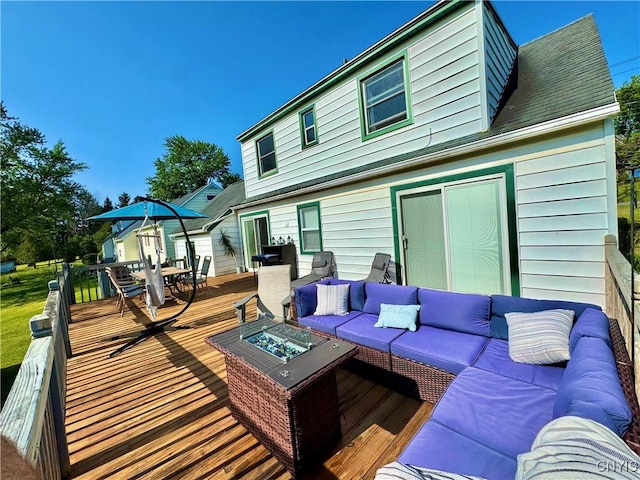 5812 S Street Rd, Fleming, NY 13021 - wooden terrace featuring an outdoor living space with a fire pit and outdoor dining space