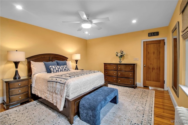 83 Bryant St Unit 7D, Buffalo, NY 14209 - bedroom featuring wood finished floors, baseboards, recessed lighting, and ceiling fan