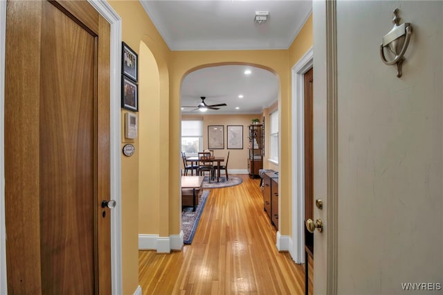 83 Bryant St Unit 7D, Buffalo, NY 14209 - hall with arched walkways, light wood-style floors, baseboards, recessed lighting, and ornamental molding
