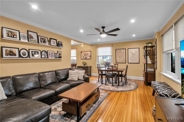 83 Bryant St Unit 7D, Buffalo, NY 14209 - living room featuring a ceiling fan, light wood-style floors, crown molding, baseboards, and recessed lighting
