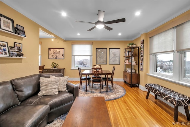 83 Bryant St Unit 7D, Buffalo, NY 14209 - living area featuring ceiling fan, light wood-style floors, baseboards, ornamental molding, and recessed lighting