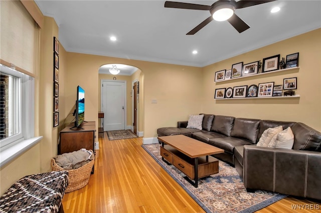 83 Bryant St Unit 7D, Buffalo, NY 14209 - living room with arched walkways, ceiling fan, light wood finished floors, recessed lighting, and baseboards