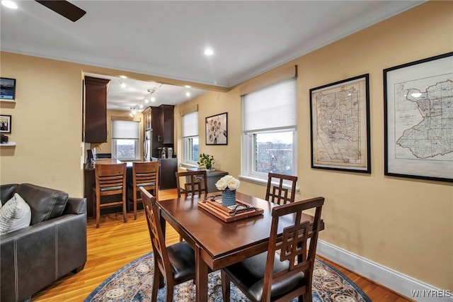 83 Bryant St Unit 7D, Buffalo, NY 14209 - dining space with light wood finished floors, ceiling fan, baseboards, ornamental molding, and recessed lighting
