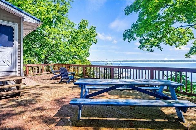 5543 Rt-89, Varick, NY 14521 - wooden deck featuring a water view and outdoor dining area