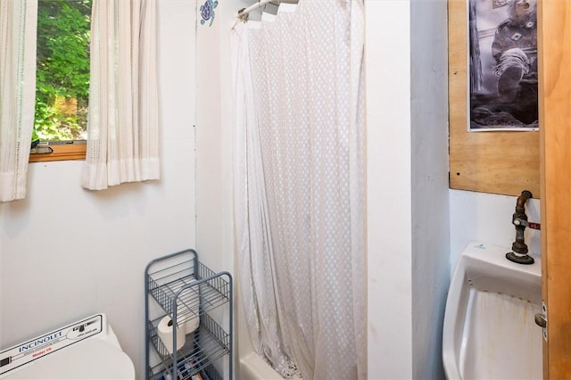 5543 Rt-89, Varick, NY 14521 - bathroom featuring toilet and shower / bath combination with curtain