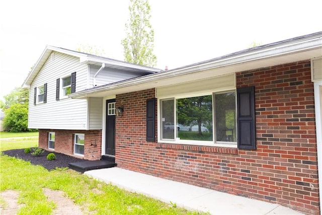 136 Nevins Rd, Henrietta, NY 14467 - view of front of property featuring brick siding