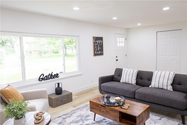 136 Nevins Rd, Henrietta, NY 14467 - living room featuring healthy amount of natural light, recessed lighting, light wood-type flooring, and baseboards
