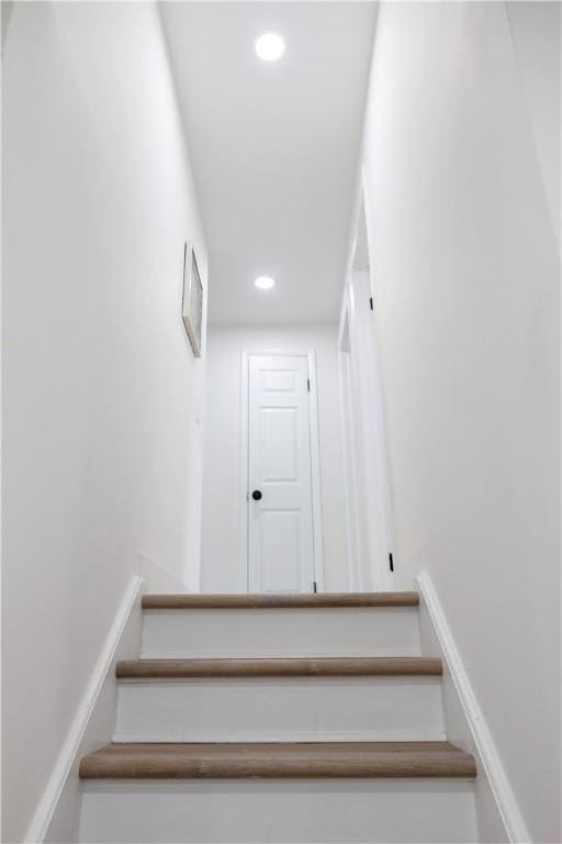 136 Nevins Rd, Henrietta, NY 14467 - staircase featuring recessed lighting