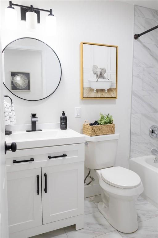 136 Nevins Rd, Henrietta, NY 14467 - bathroom featuring marble finish flooring, vanity, toilet, and  shower combination