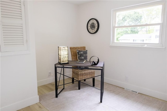 136 Nevins Rd, Henrietta, NY 14467 - office area featuring baseboards and wood finished floors