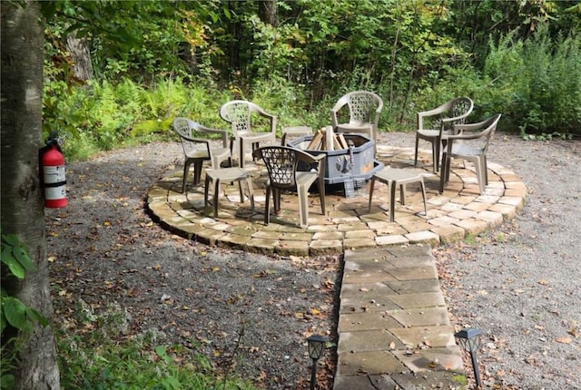 1937 County Highway 8, Otego, NY 13825 - view of patio / terrace featuring a fire pit