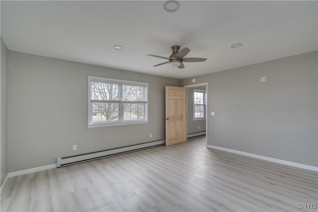 34292 State Route 26, Champion, NY 13619 - spare room with a baseboard heating unit, light wood-type flooring, baseboards, and recessed lighting