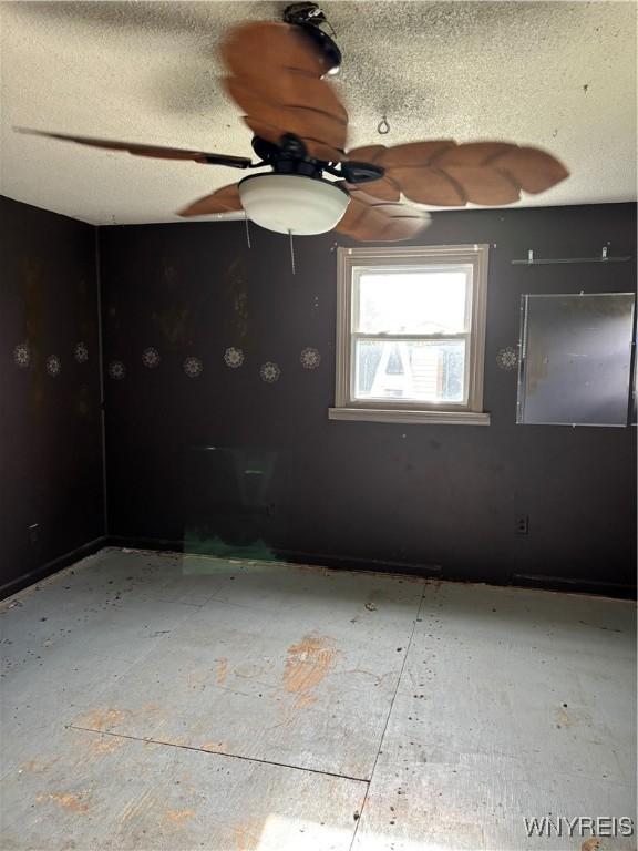55 Awood Pl, Cheektowaga, NY 14225 - spare room with a textured ceiling and a ceiling fan