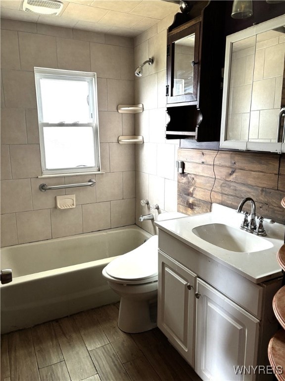 55 Awood Pl, Cheektowaga, NY 14225 - full bathroom with wood finished floors, vanity, and shower / washtub combination