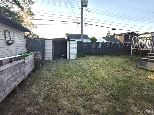 55 Awood Pl, Cheektowaga, NY 14225 - fenced backyard featuring a shed and a wooden deck