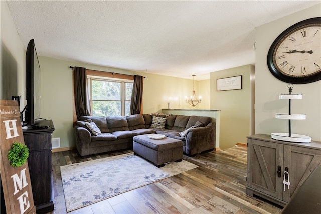 44 Hidden Creek Ln, Hamlin, NY 14464 - living area featuring a chandelier and hardwood / wood-style floors