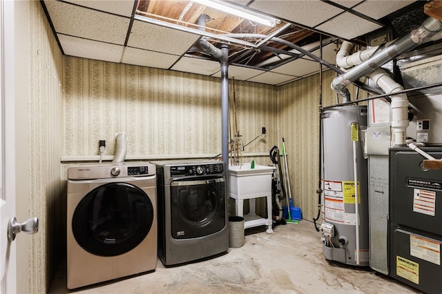 44 Hidden Creek Ln, Hamlin, NY 14464 - washroom with gas water heater, washing machine and clothes dryer, and wallpapered walls