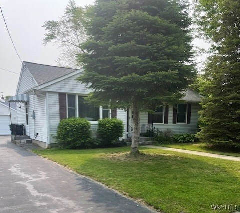 1003 98th St, Niagara Falls, NY 14304 - view of front of home featuring a front lawn