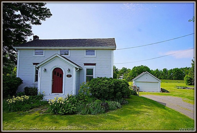 2477 Ridge Rd, Lewiston, NY 14131 - view of front of property with an outbuilding, a front lawn, a chimney, and a detached garage