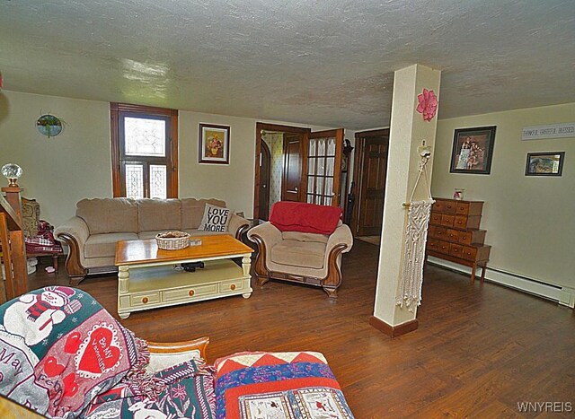 2477 Ridge Rd, Lewiston, NY 14131 - living area featuring wood finished floors, a textured ceiling, and baseboards