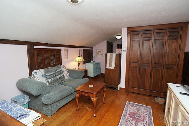 2477 Ridge Rd, Lewiston, NY 14131 - living room featuring vaulted ceiling and hardwood / wood-style flooring