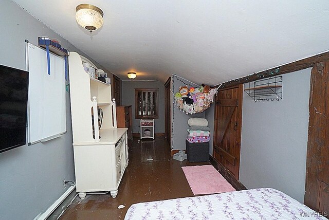 2477 Ridge Rd, Lewiston, NY 14131 - bedroom with lofted ceiling and concrete floors