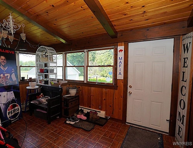 2477 Ridge Rd, Lewiston, NY 14131 - entryway featuring baseboard heating, wood walls, wooden ceiling with exposed beams, and brick patterned flooring