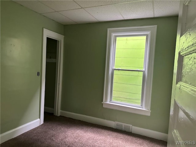 64 Barton St, Buffalo, NY 14213 - carpeted empty room featuring baseboards and a drop ceiling