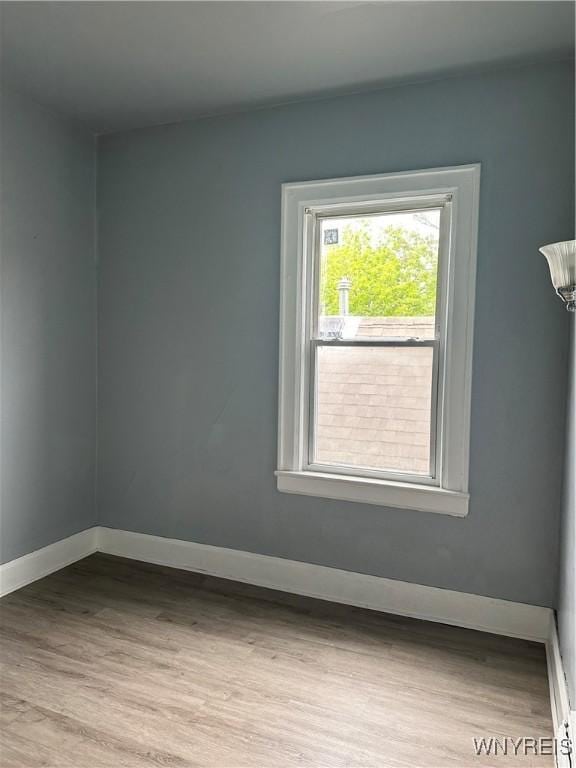 64 Barton St, Buffalo, NY 14213 - empty room featuring baseboards and wood finished floors