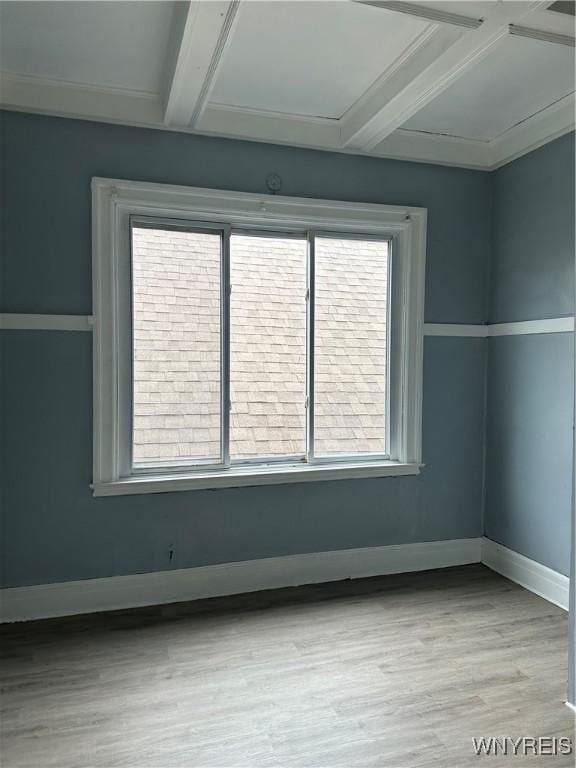 64 Barton St, Buffalo, NY 14213 - unfurnished room featuring beamed ceiling, wood finished floors, and baseboards