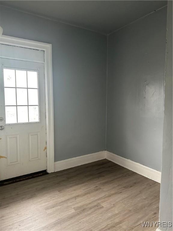 64 Barton St, Buffalo, NY 14213 - entryway featuring light wood-style floors and baseboards